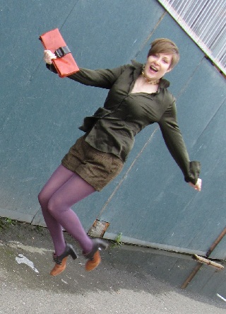 tweed shorts and vegan clutch